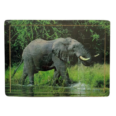 Jigsaw puzzle with an elephant design on a white background