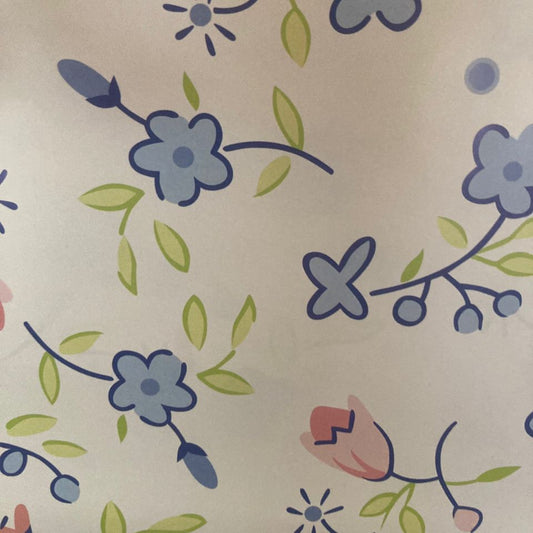 Floral pattern with blue, green, and pink flowers on a beige background