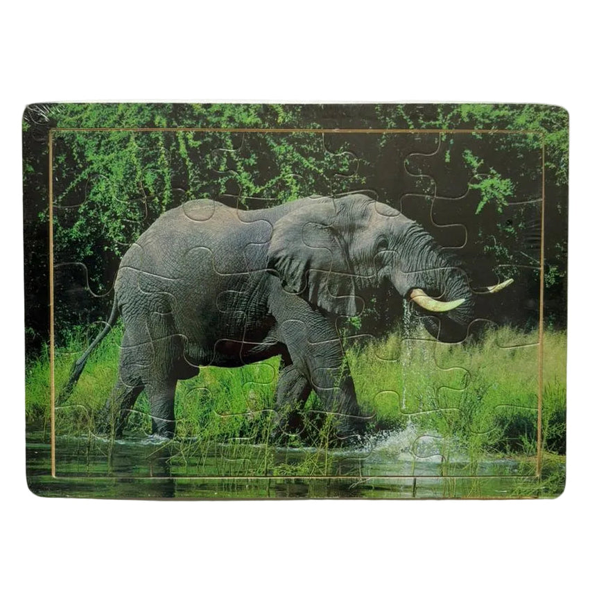 Jigsaw puzzle with an elephant design on a white background