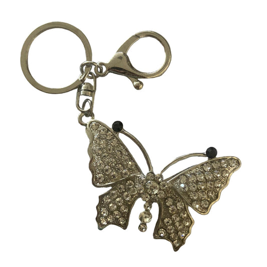 Butterfly keychain with rhinestones on a white background