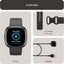 Smartwatch with display, two straps, and charger in a box set on a light gray background.